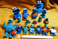 Lot B56: 18 Cookie Monster Figurines &amp; Toys Sesame Street Henson