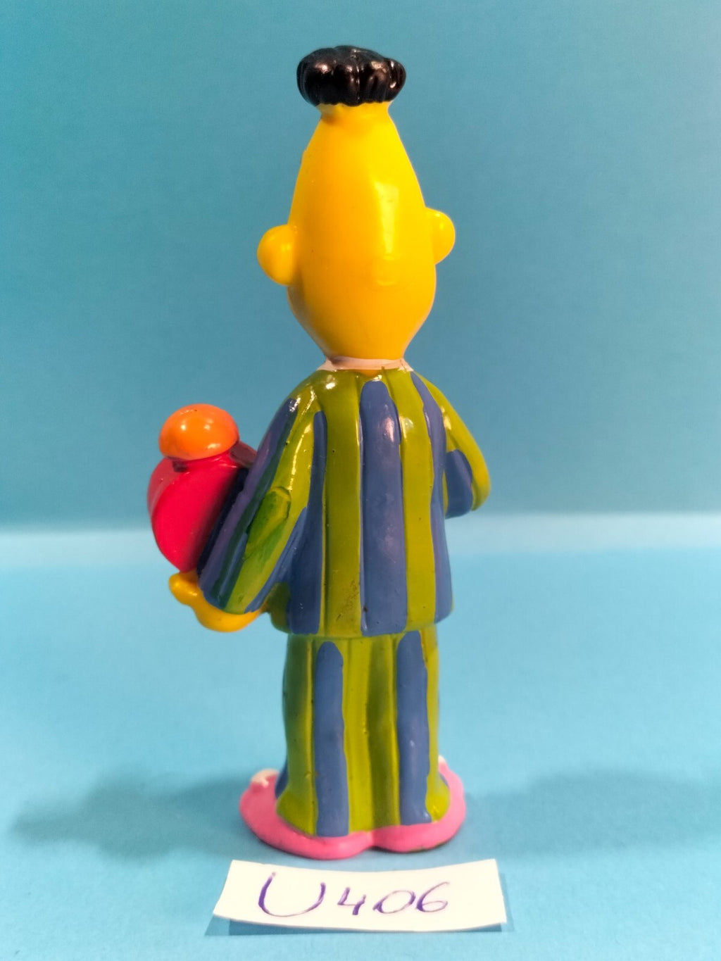Figura de Barrio Sésamo U406: Reloj despertador pijama de Bert - Henson Muppets Inc