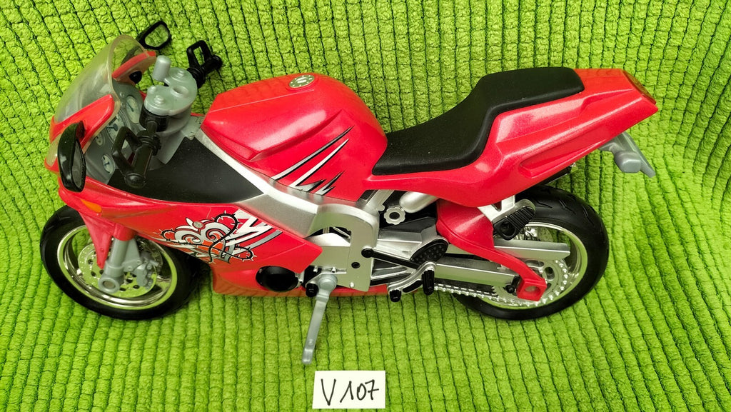 Lot V107: Flavas Mattel red motorcycle
