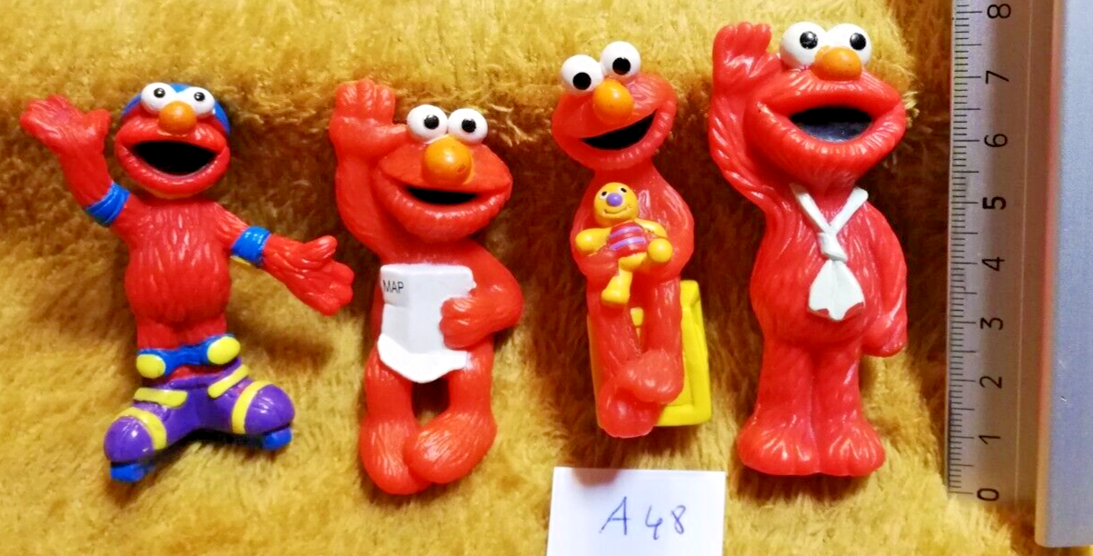 Lot A48 : 4 Figurines ELMO RUE SESAME street - Henson