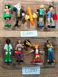 Lot U889/U890: 10 street character/sports/tourist figurines
